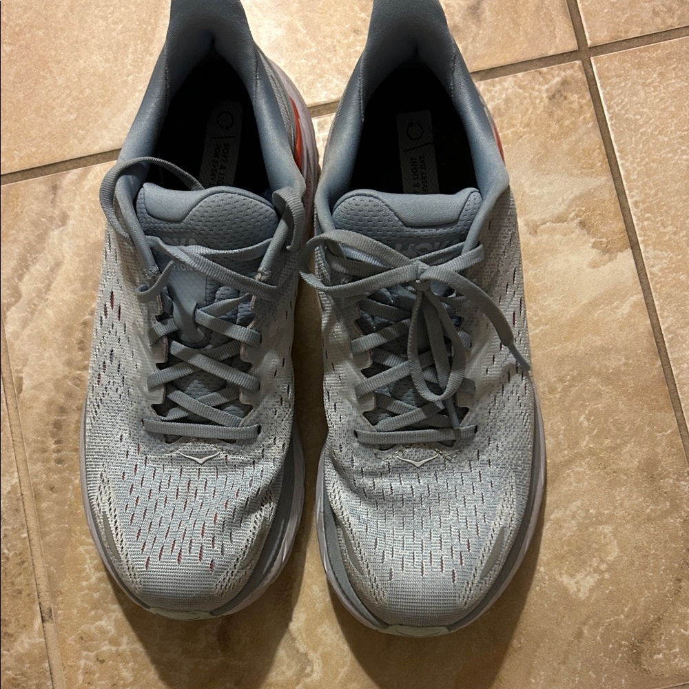 Hoka Women’s Grey and Orange Athletic Shoes